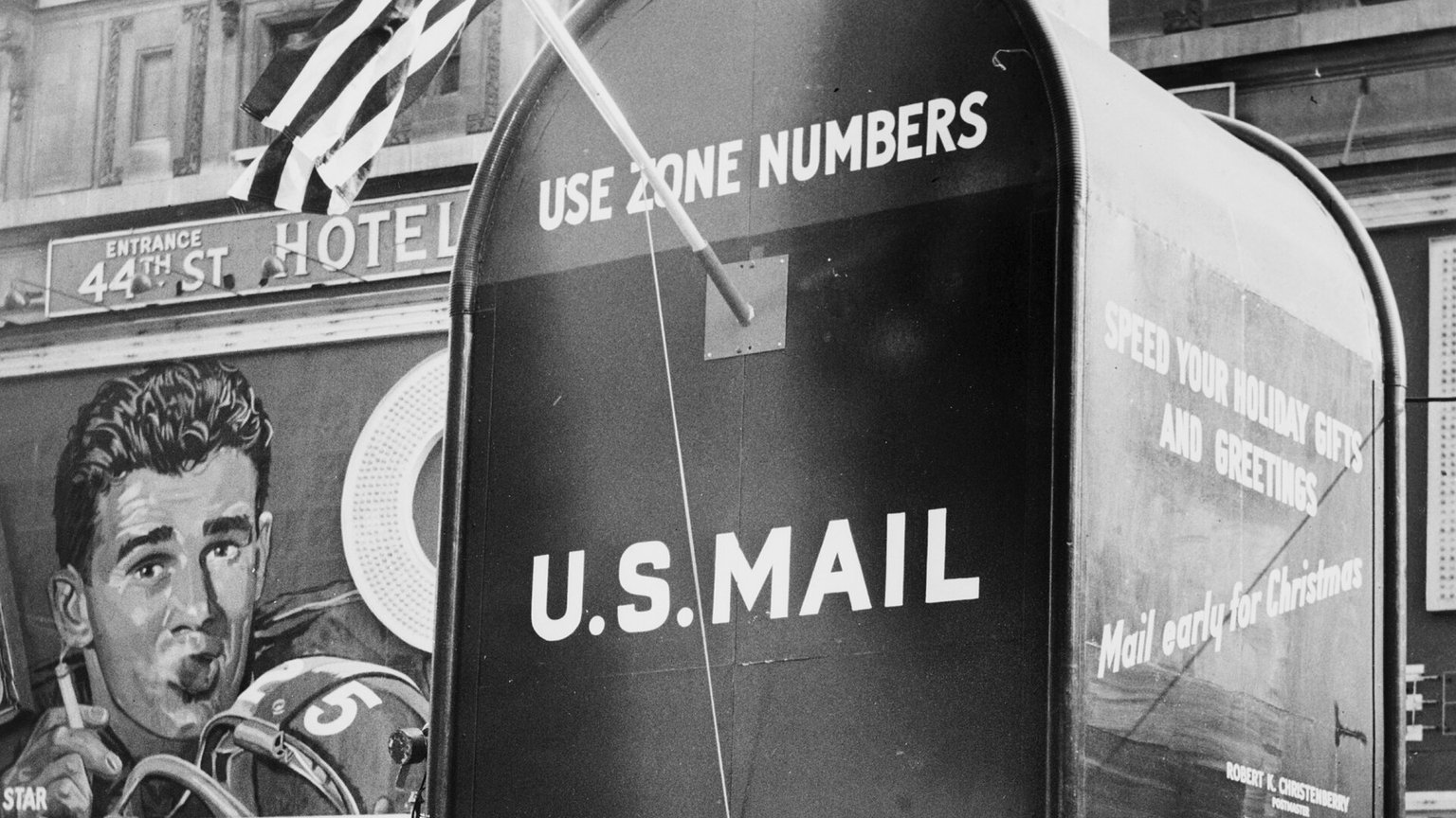 A giant &ldquo;U.S. Mail&rdquo; mailbox booth in Times Square, New York, 1961, reading &ldquo;Use zone numbers&rdquo; and &ldquo;Mail early&rdquo;